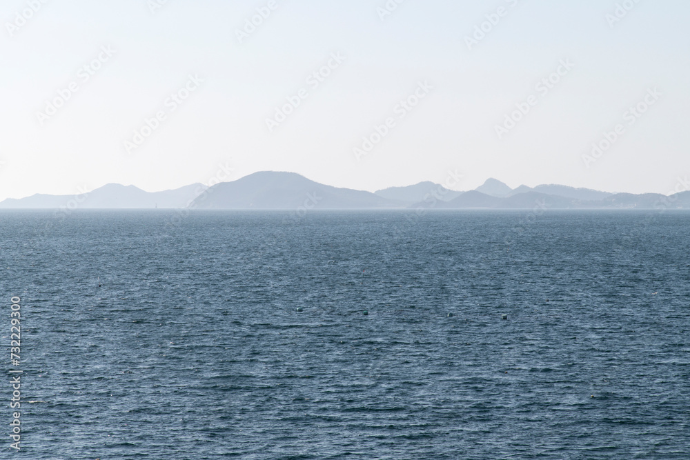 Seascape with the horizon on a sunny day
