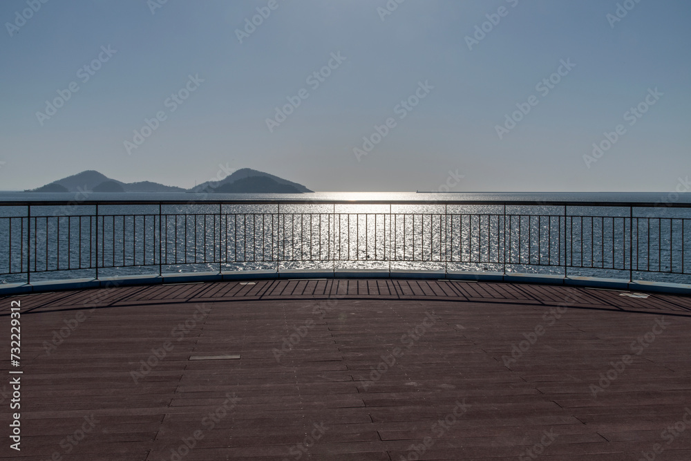 Seascape with the observatory and horizon on a sunny day