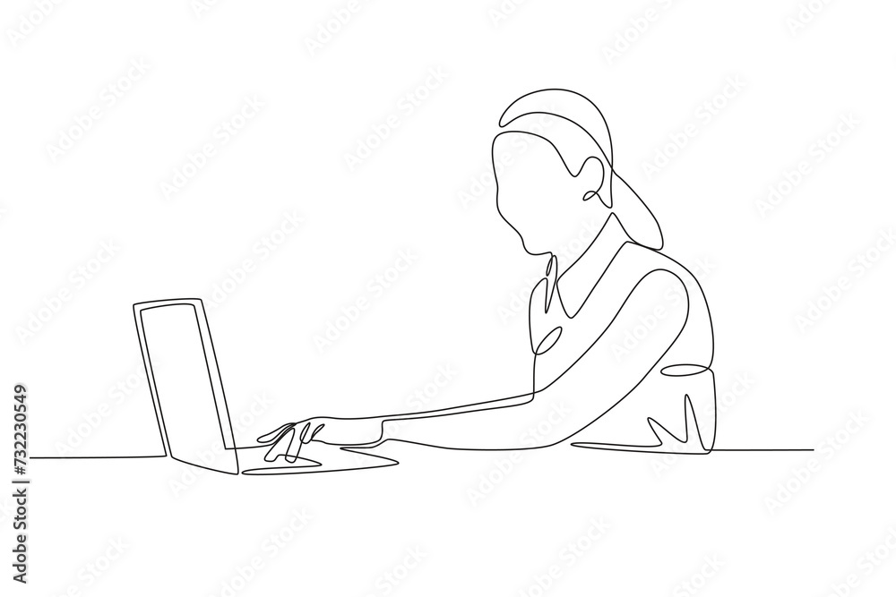 A woman is working indoors