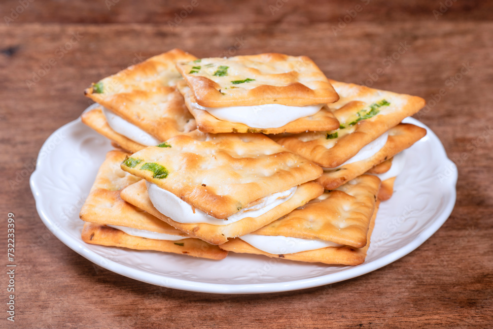 Scallion cookie nougats with tea on the plate Scallion cookie nougats with tea on the plate