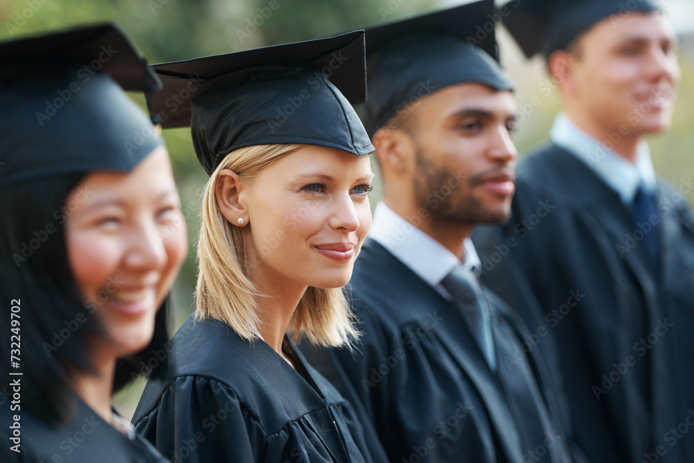 Woman, graduation and students in college or university to celebrate school diploma or degree. Diversity, graduate scholarship or proud community with education certificate in line at ceremony event Woman, graduation and students in college or university to celebrate school diploma or degree. Diversity, graduate scholarship or proud community with education certificate in line at ceremony event