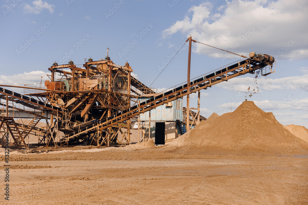 Sand quarry banner, Industrial plant with belt conveyor in open pit mining. Construction site, Industry machine for stone crusher Sand quarry banner, Industrial plant with belt conveyor in open pit mining. Construction site, Industry machine for stone crusher