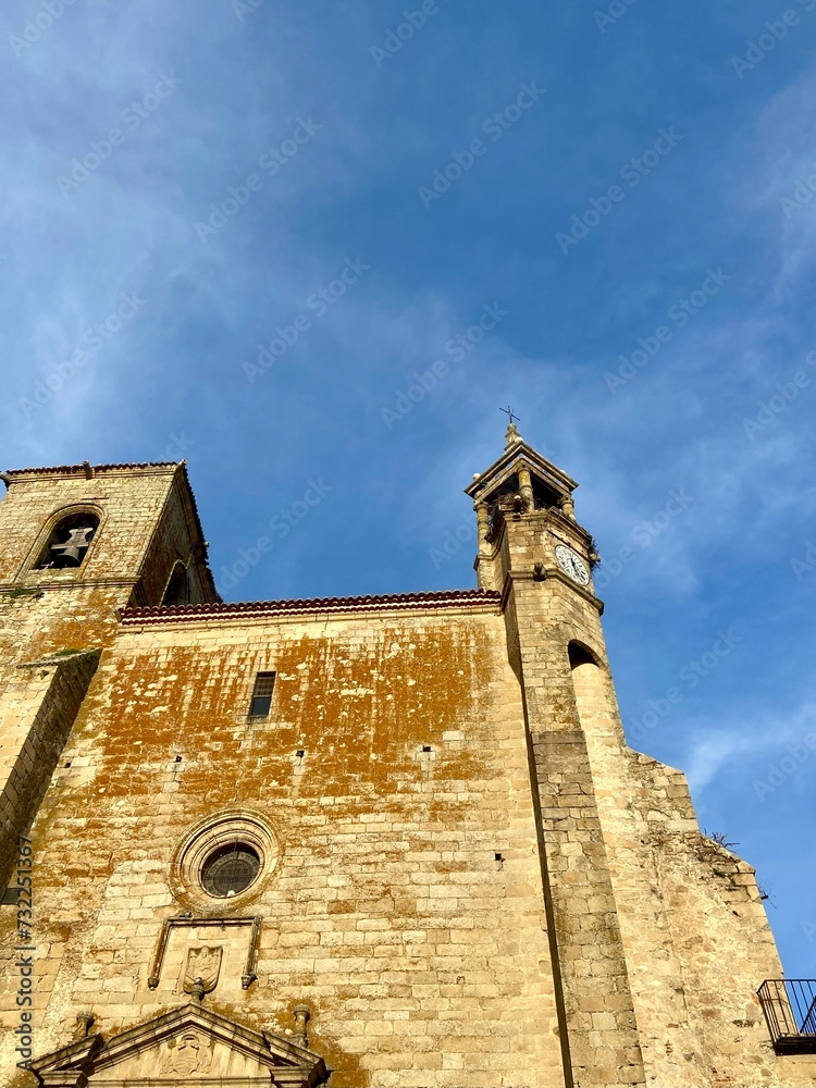church Detail of medieval architecture under blue sky, in Girona, Catalonia, Spain.