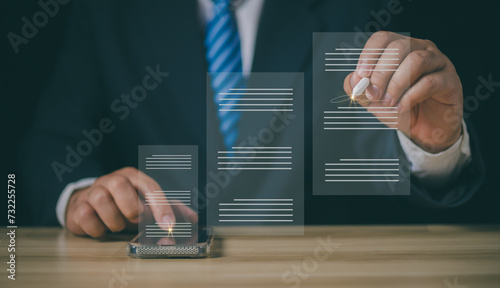 Electronic signature business concept. Businessman signs an electronic document, business approved, executing plan, project approved. Digital signature. Electronic documents, digital business, online. photo