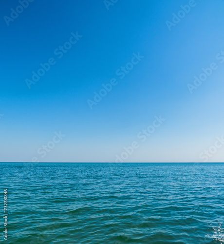 Vertical front view landscape Blue sea and sky blue background morning day look calm summer Nature tropical sea Beautiful ocen water travel "Bangsaen Beach" East thailand Chonburi Exotic horizon.