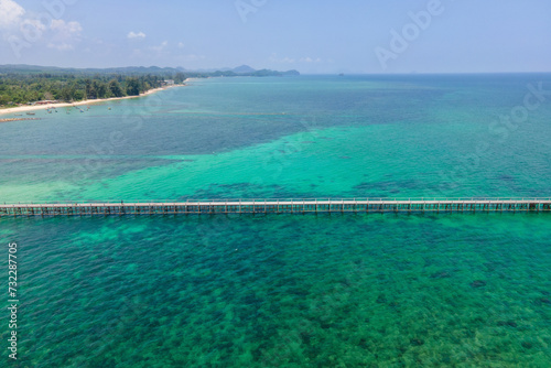 Blue sea with a bridge in the middle of the sea with blue water