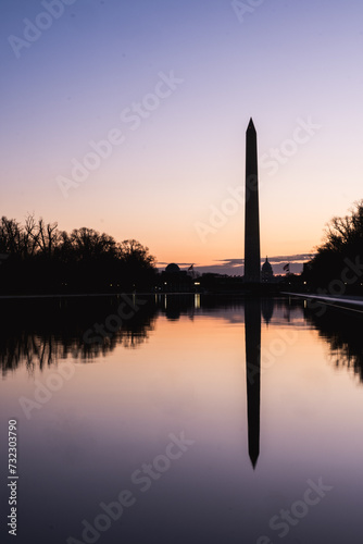 Washington Monument in silhouette on winter morning.