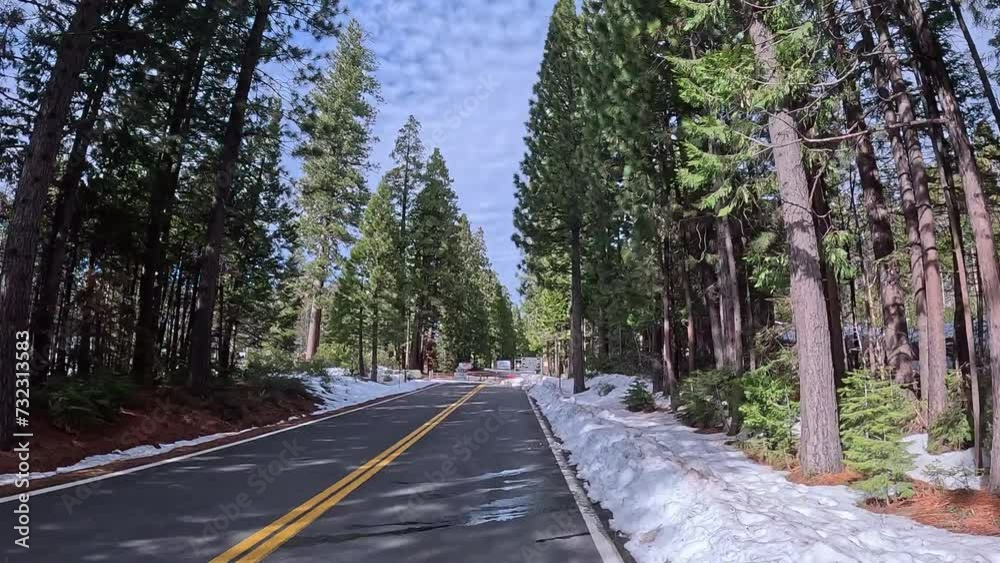 Driving Car on California State Route 108 Highway - Arriving at Closed Road in Snow Park at the Beginning of the Winter Season. Weather Conditions Traffic Closure. Frustrated Plans Concept. Driving Car on California State Route 108 Highway - Arriving at Closed Road in Snow Park at the Beginning of the Winter Season. Weather Conditions Traffic Closure. Frustrated Plans Concept.