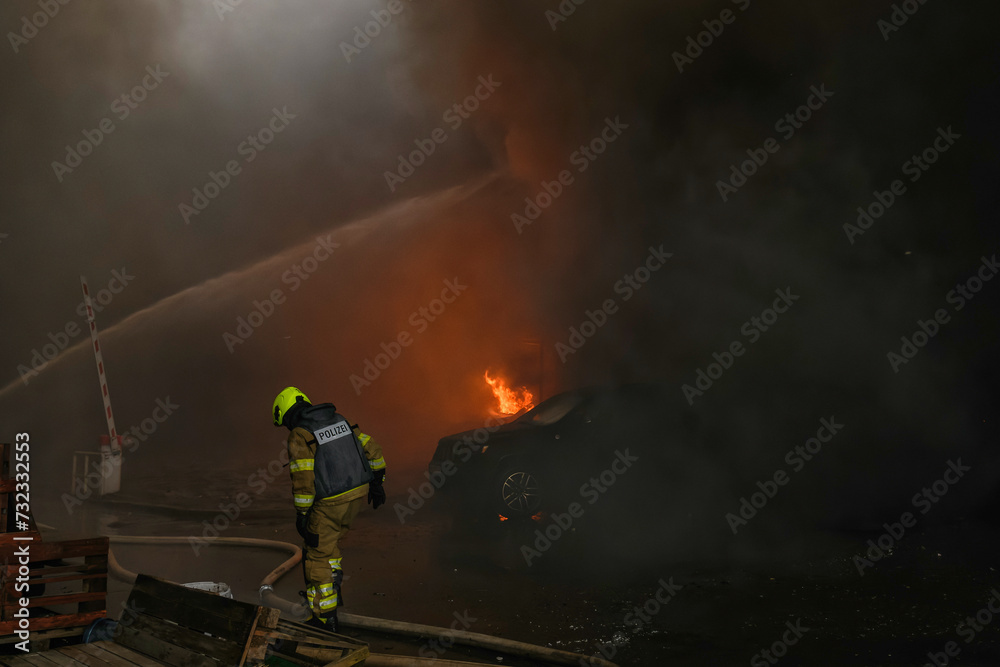 Firefighters extinguish a burning building at a site of a russian missile strike in Kyiv, Ukraine January 2, 2024