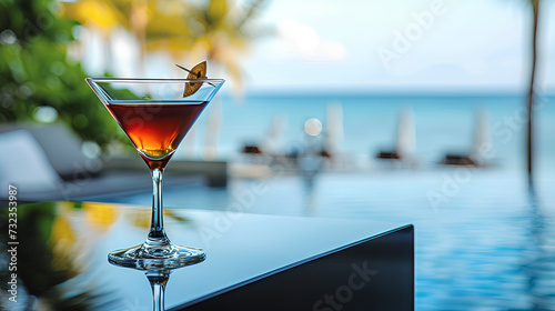 A glass of cocktail elegantly placed on a sleek black table © mizan