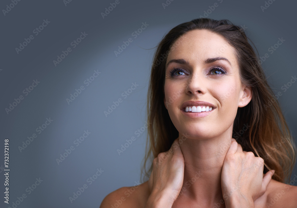 Smile, woman and skincare with happiness in studio, grey background and happy for skin treatment and glow. Beauty, health cosmetics and thinking in fresh natural look with self care and mockup. Smile, woman and skincare with happiness in studio, grey background and happy for skin treatment and glow. Beauty, health cosmetics and thinking in fresh natural look with self care and mockup.