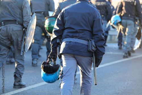 Vicenza, VI, Italy - January 20, 2024: police in riot gear during the protest demonstration with helmets