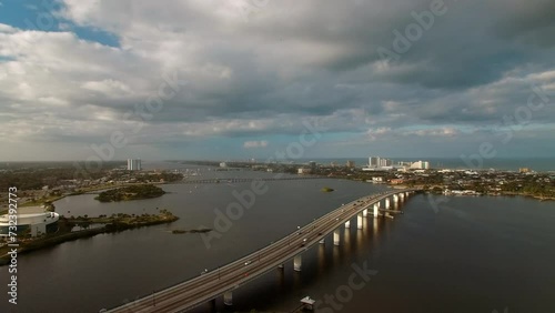 Wallpaper Mural Aerial Panning Shot Of Cars Moving On Segmental Bridge Over Halifax River Under Cloudy Sky - Daytona Beach , Florida Torontodigital.ca