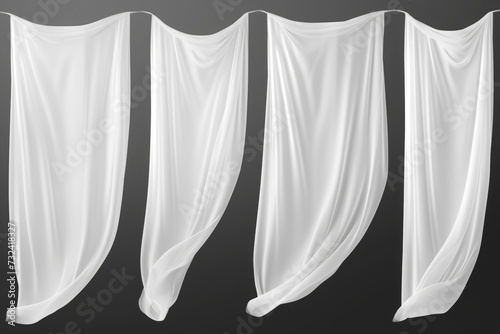 Four white drapes on a black background. Versatile and elegant image for various design projects photo