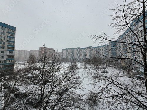 Canvas Print multi-storey buildings in the snow