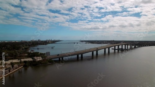 Wallpaper Mural Aerial Shot Of Belleair Causeway And Broadway Bridge In City, Drone Flying Forward Over River On Sunny Day - Daytona Beach , Florida Torontodigital.ca