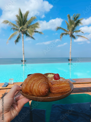 Tropical pool with pastries 