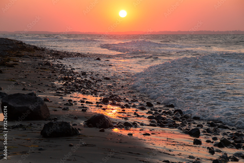 Foaming sea at sunset, seascapes Foaming sea at sunset, seascapes