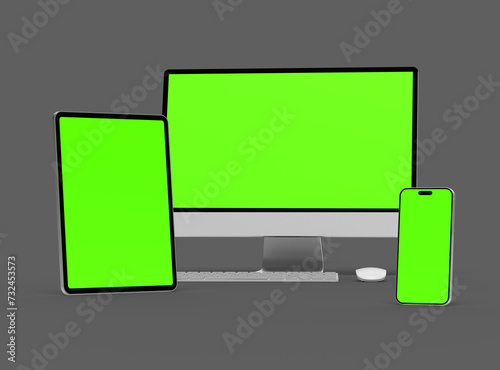 3D Render of smartphone tablet desktop with green screens on a dark background © DAkreev