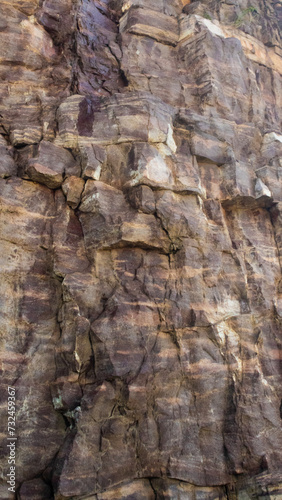 a colorful rock face layers