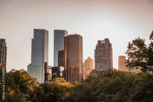 Breathtaking view of the New York City skyline at sunset, featuring the iconic Central Park.