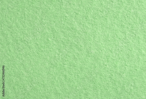 Green textile texture,cleaning cloth background.Felt background.