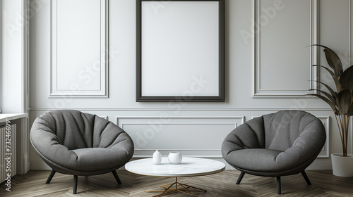 Minimalist background with comfortable chairs next to a coffee table and a frame hanging on the wall with white space for graphics or text