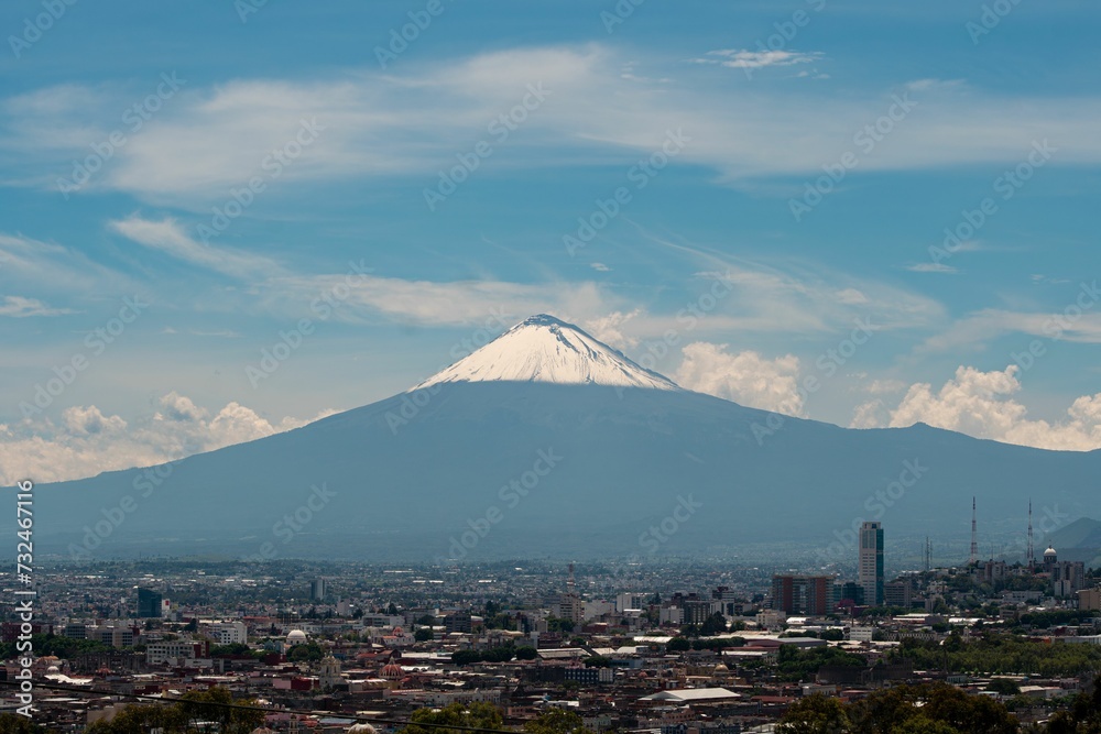 Skyline of Puebla with the volcano in the background. Mexico