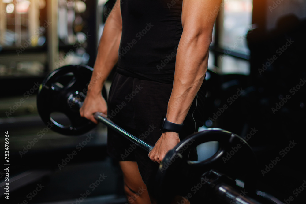 Exercise with dumbbells Lift weights to build strong arm muscles, an activity for good physical health. Exercise with dumbbells Lift weights to build strong arm muscles, an activity for good physical health.