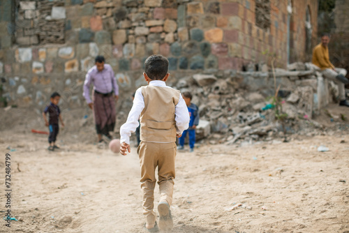 Child playing in Taiz, Yemen