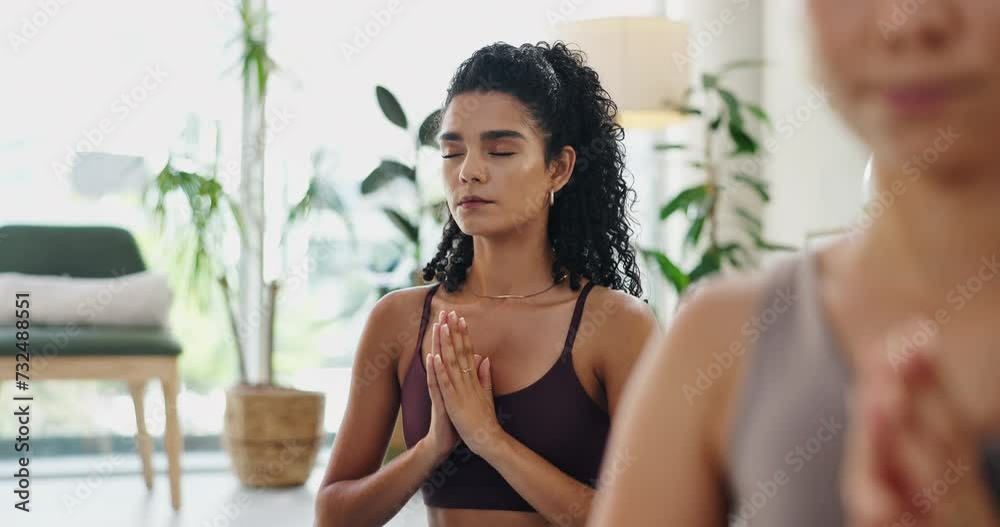 Woman, yoga and meditation in class for holistic wellness, zen and healing in breathing exercise. People or friends with namaste, peace and prayer hands for mindfulness, mental health and calm