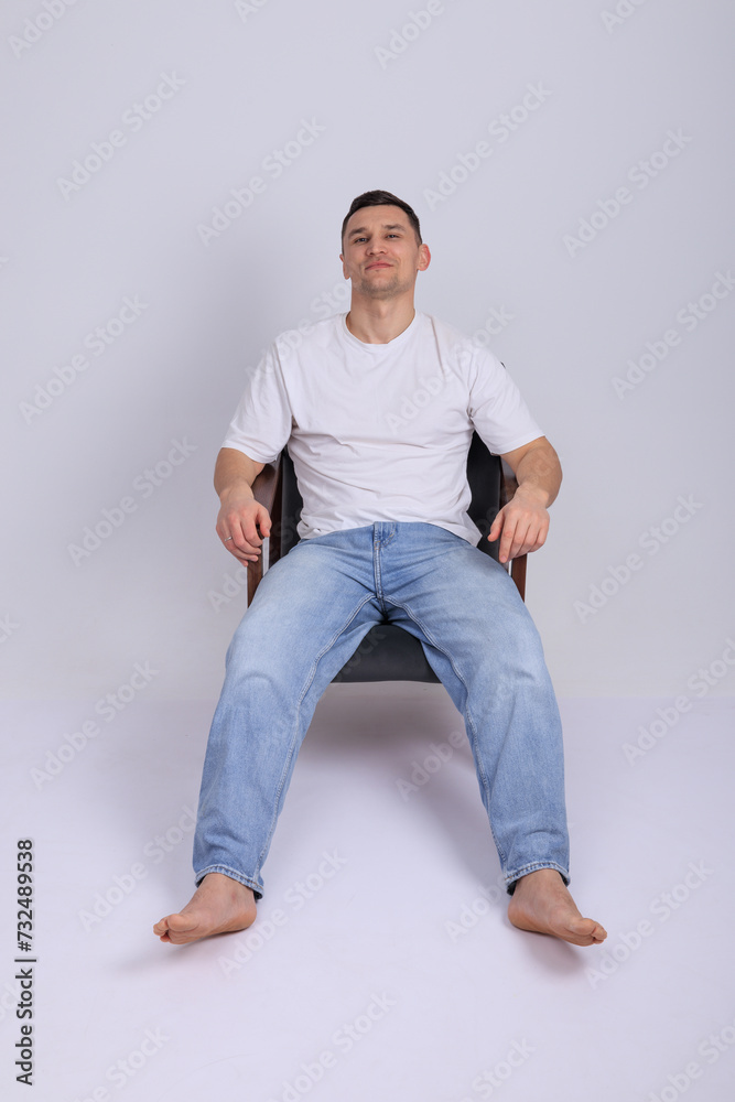 In this captivating minimalist portrait, a man emanates strength and quiet confidence. In this captivating minimalist portrait, a man emanates strength and quiet confidence.