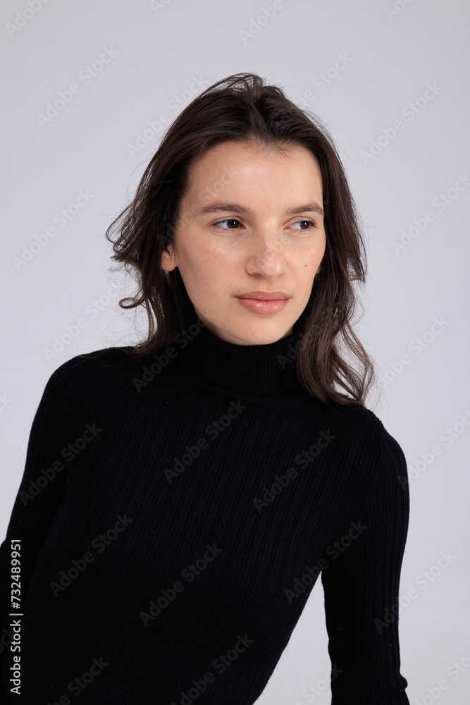 In this captivating minimalist portrait, a girl exudes timeless elegance. In this captivating minimalist portrait, a girl exudes timeless elegance.