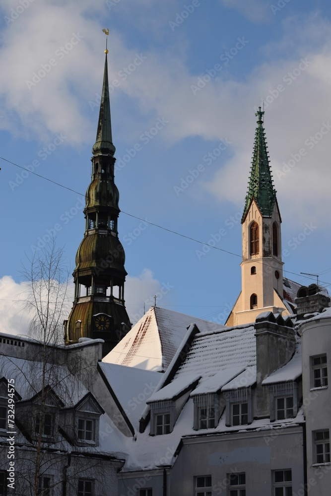 Obraz premium Grand medieval building, St Peter church, stands prominently in the city of Riga, Latvia
