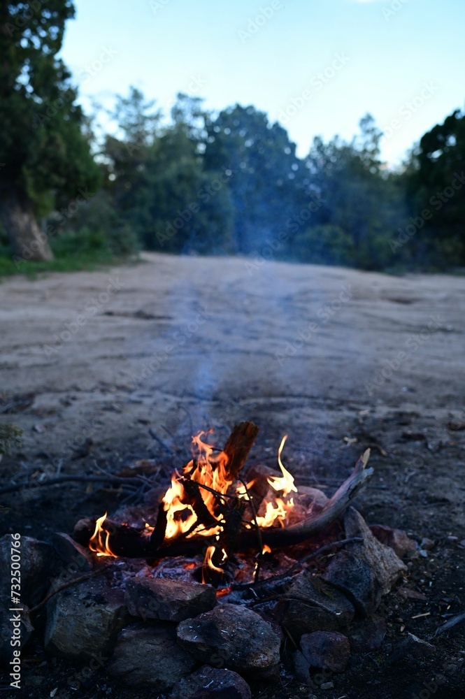 there is a small campfire that appears to be lit