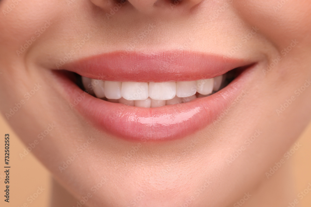 Obraz premium Woman with beautiful lips smiling, closeup view
