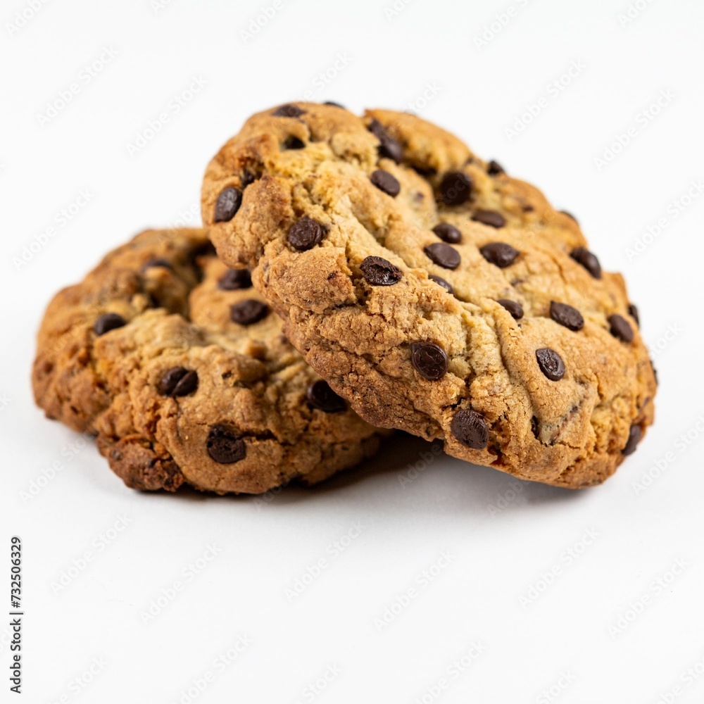 Closeup of fresh chocolate chip cookies on a white background Closeup of fresh chocolate chip cookies on a white background