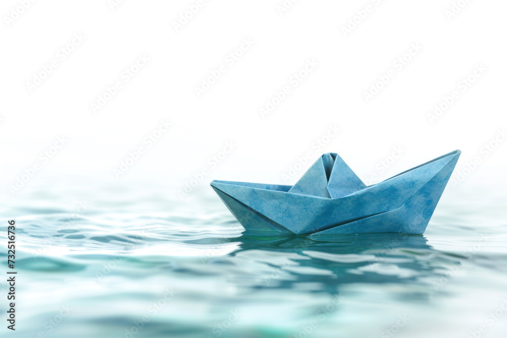 Origami paper boat on white background.