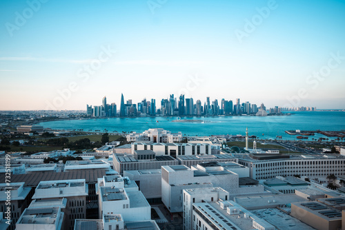 Doha, Qatar - February 3, 2024 -Doha Towers with water in front of them and the Msheireb buildings in the heart of Doha in Qatar