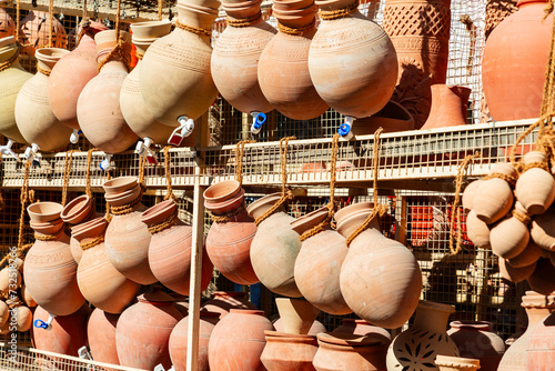 Traditional water jugs for sale on souk, Oman