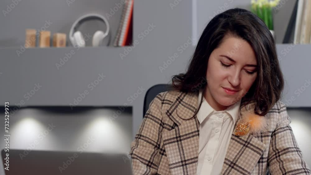 Mid shot young female psychologist in business team having a video call. Professional personal consultant asking her clients any extra requests using notebook. Work with patients online Mid shot young female psychologist in business team having a video call. Professional personal consultant asking her clients any extra requests using notebook. Work with patients online