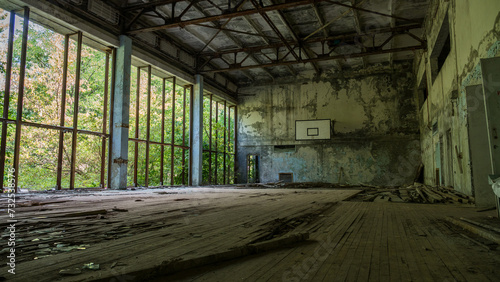Inside sports complex destroyed abandoned building House Culture Energetik in ghost city Pripyat after explosion fourth reactor Chernobyl nuclear power plant. Exclusion Zone. Radiation. Ukraine