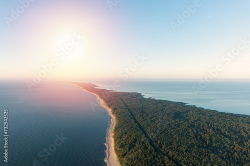 Curonian Spit wth Baltic sea coastline on sunset. Kurshskaya kosa national park near Zelenogradsk. Aerial view