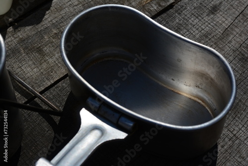 Combination pot with flask in nature.