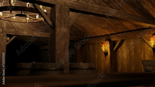 Inside the tavern there are lit torches and a chandelier with candles. 3D animation.
