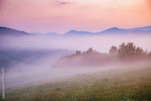 Fototapeta Naklejka Na Ścianę i Meble -  A tranquility view of the mountainous area in the haze. Carpathian National Park, Ukraine, Europe.