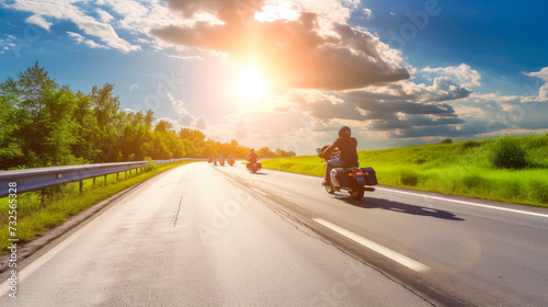 Thrilling Biker Convoy Beneath Majestic Clouds