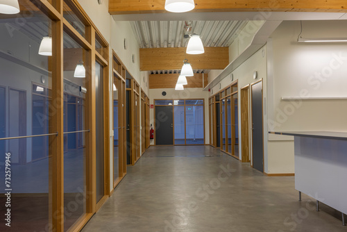 Beautiful view of the modern lobby of the building with several isolated rooms. Sweden.