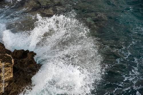 Splashing waves on the rocky coast