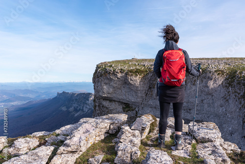 Mountaineer contemplating the top of the mountain. Sierra de Andia, Navarra photo